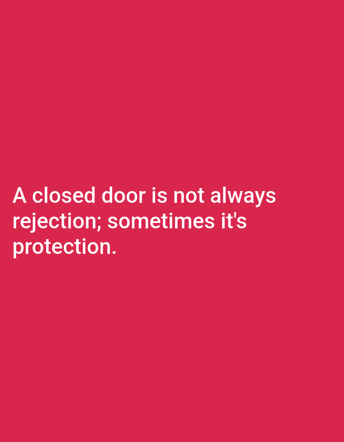 The image is a minimalist, text-based graphic featuring a solid, vibrant red background. White sans-serif text is prominently displayed, positioned in the lower half of the frame and appears to be left-aligned. The text conveys an inspirational message: "A closed door is not always rejection; sometimes it's protection." There are no other discernible subjects, objects, or environmental details present in the image. The high contrast between the white text and the bright red background ensures readability.