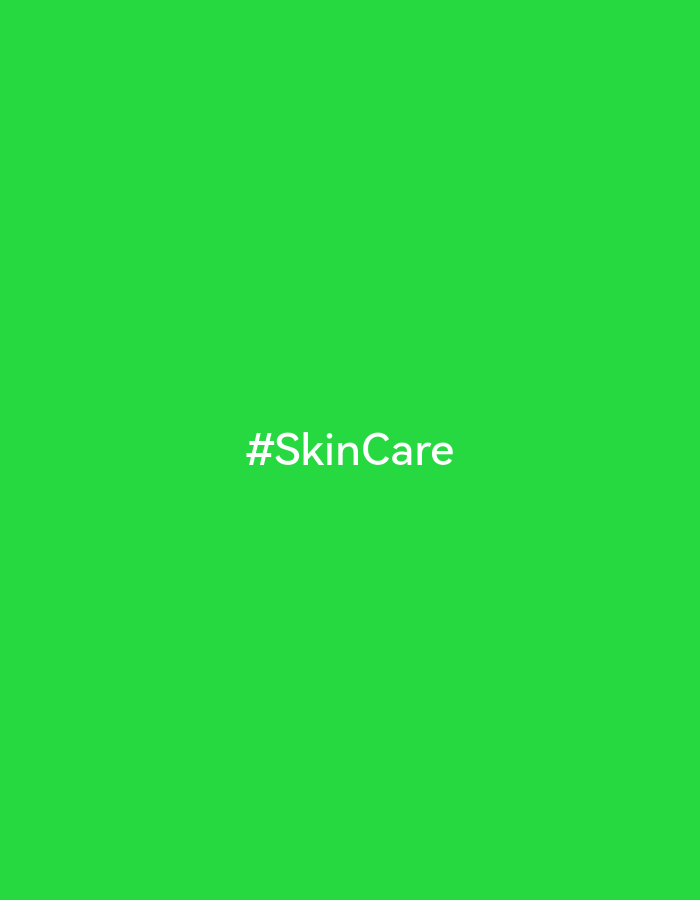 The image is a green background with the white text "#SkinCare" centered horizontally and vertically. There is no evidence of location in Sterlitamak, Russia, or any other city. There are no people, subjects, objects, actions, or interactions depicted in the image beyond the text itself. The environment is a simple, monochromatic color field.