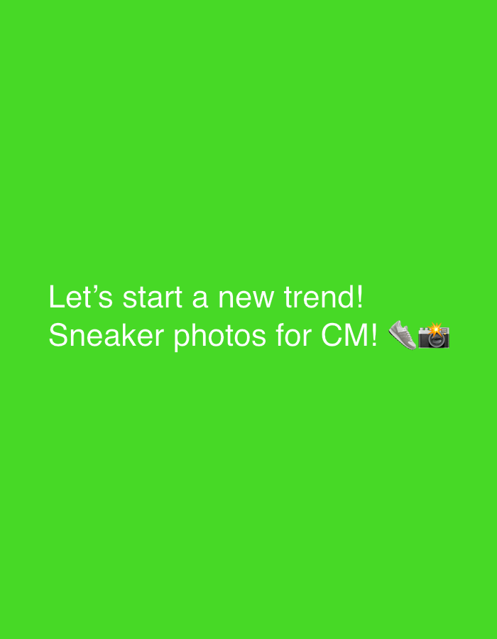 The image is a bright green, solid background. White text is overlaid on the bottom half of the image. The text reads: "Let's start a new trend! Sneaker photos for CM!" To the right of the text are two emojis: a sneaker and a camera with a flash. There are no people, objects, or environmental details present in the image besides the text and emojis. The image is not located in the city of Even Yehuda, Israel.