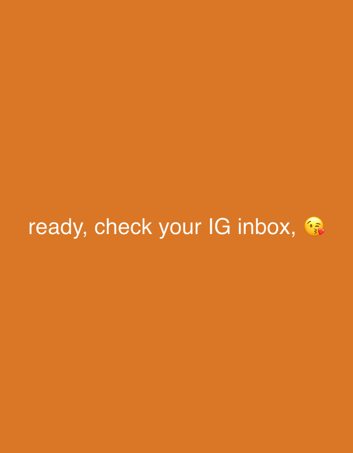 The image contains text that reads "ready, check your IG inbox," followed by a kissing face emoji. The background is a solid, vibrant orange. There are no people, subjects, objects, or actions depicted beyond the text and emoji. The image is not set in any specific location, nor does it provide any information about Los Velásquez, Venezuela.