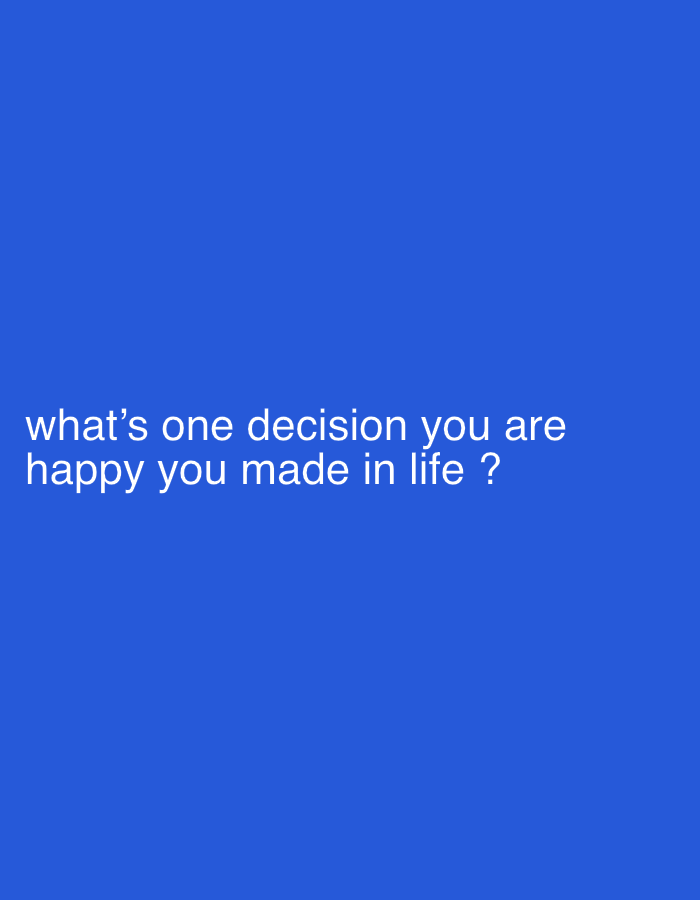 The image displays white text on a solid royal blue background. The text reads "what's one decision you are happy you made in life?". There is no discernible urban environment, nor any people or specific objects to indicate a location in Umuahia, Nigeria.