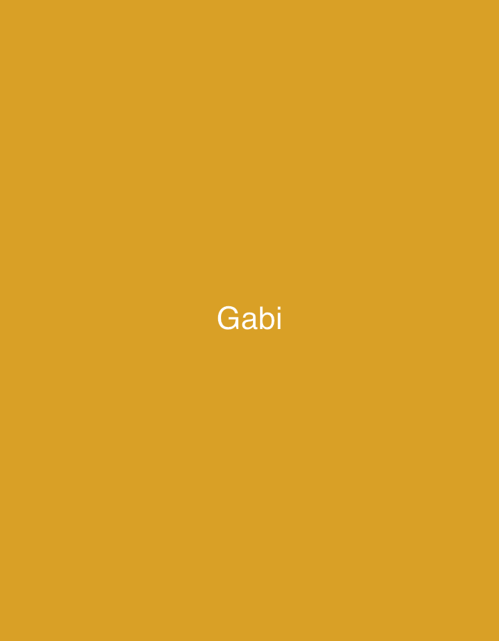 The image features a solid, monochromatic background in a shade of mustard yellow or deep gold. Centered vertically and horizontally on this plain background is the single word "Gabi," rendered in clear white, sans-serif text.
There are no discernible subjects such as people, specific objects, or an identifiable scene or setting present in the image, other than the text itself and the colored backdrop. Consequently, no activity or event is depicted.
Notable details like the time of day, weather conditions, or specific location cues are entirely absent within the visual content of the image. The image conveys no specific emotions. The only visible text is "Gabi." Although the context mentions Yerevan, Armenia, the image itself provides no visual information to corroborate this location. The overall aesthetic is minimalistic, focusing solely on the name "Gabi" against a warm, solid color.