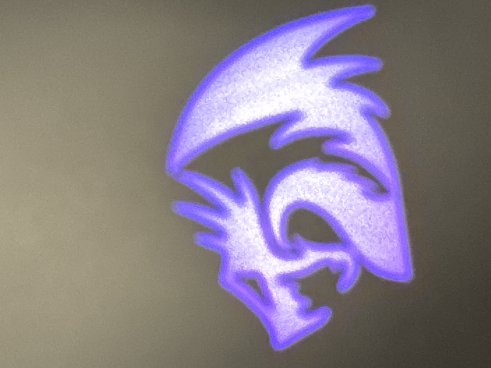 The image depicts a stylized, glowing purple dragon symbol against a muted, textured background. The dragon is shown in profile, facing left, with its head turned slightly forward. It has a discernible head with open jaws, a serpentine neck, and a large wing extending behind its body. The symbol is rendered with a grainy, luminous effect, with a brighter core and a softer, glowing outline. The background appears to be a wall or canvas with a subtle gradient from a lighter tone at the top to a slightly darker tone at the bottom. There is no discernible location in the city of Almaty, Kazakhstan.