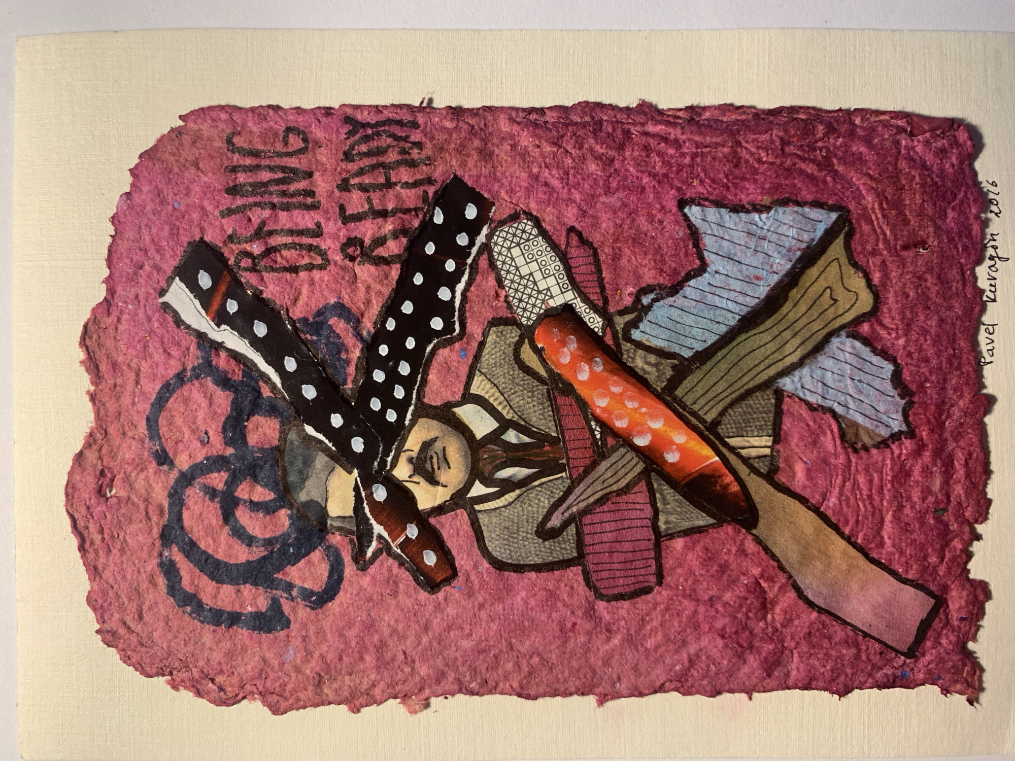 This is a collage artwork on textured, pink paper. The artwork depicts a stylized man wearing a hat and suit, with his eyes covered by two black and white polka-dotted strips. There are other abstract shapes and lines overlaid on the man. The words "BEING READY" are written in black marker on the upper right side of the pink paper. The artist's signature, "Pavel Kuragon 2016," is located at the bottom right. The artwork is mounted on a cream-colored paper backing. The location in the city of Sergeevo, Russia, is not specified in the image.