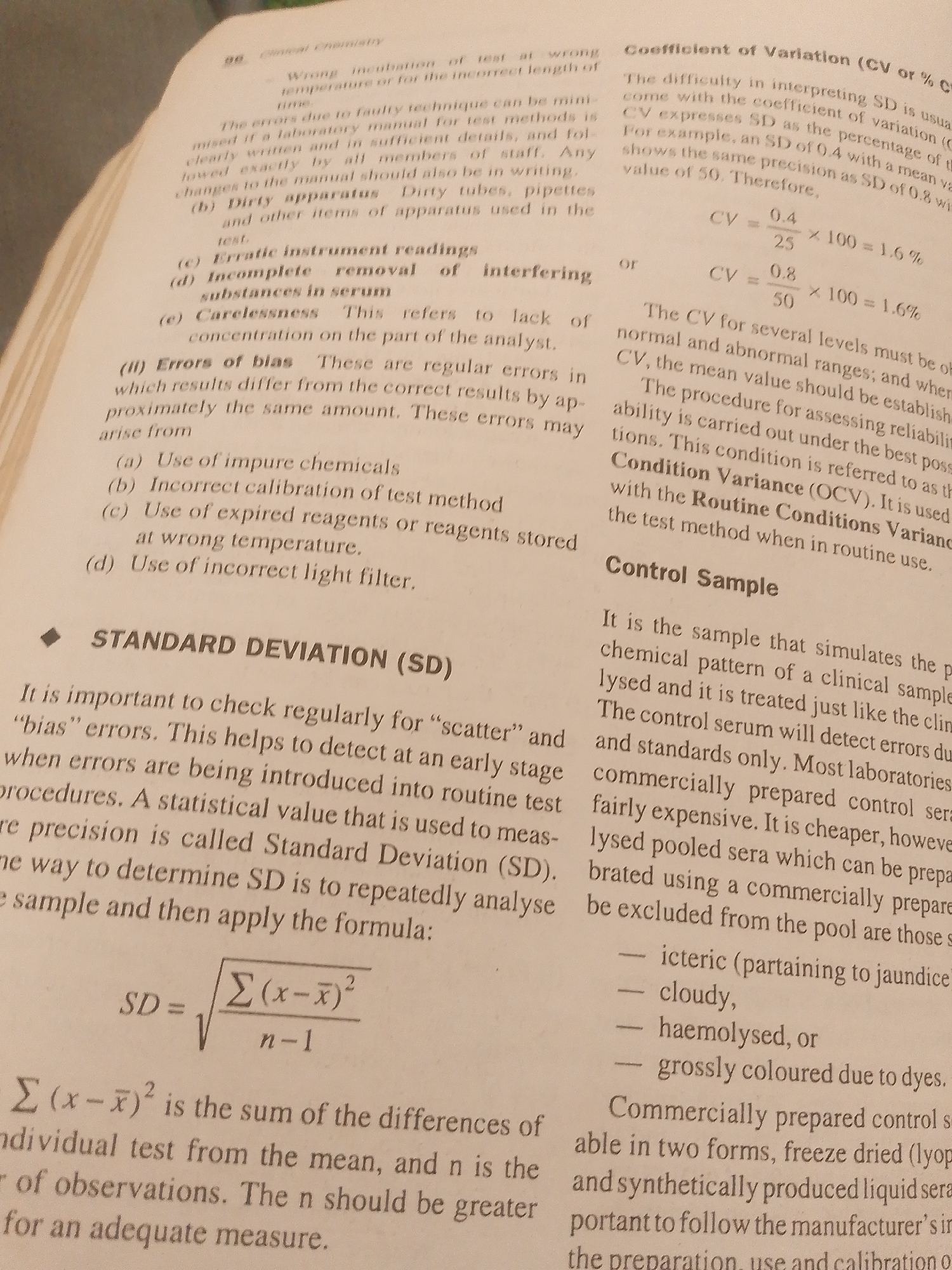 The image shows a page from a textbook on clinical chemistry. The text discusses concepts like "Errors of bias," "Standard Deviation (SD)," and "Control Sample." There are also mathematical formulas related to standard deviation and coefficient of variation. The setting is a book with printed text and equations. There are no people, animals, or specific objects beyond the book itself. The focus is entirely on the educational content presented in the text. The text is black on a white background, with some blue highlighted text. There is no information about the time of day, weather, or specific location within Jalingo, Nigeria, as the image is a close-up of a book page and does not contain any external environmental cues. The emotions conveyed are neutral, as it is an educational document. Visible text includes section titles, explanations of statistical concepts and formulas, and lists of potential errors.