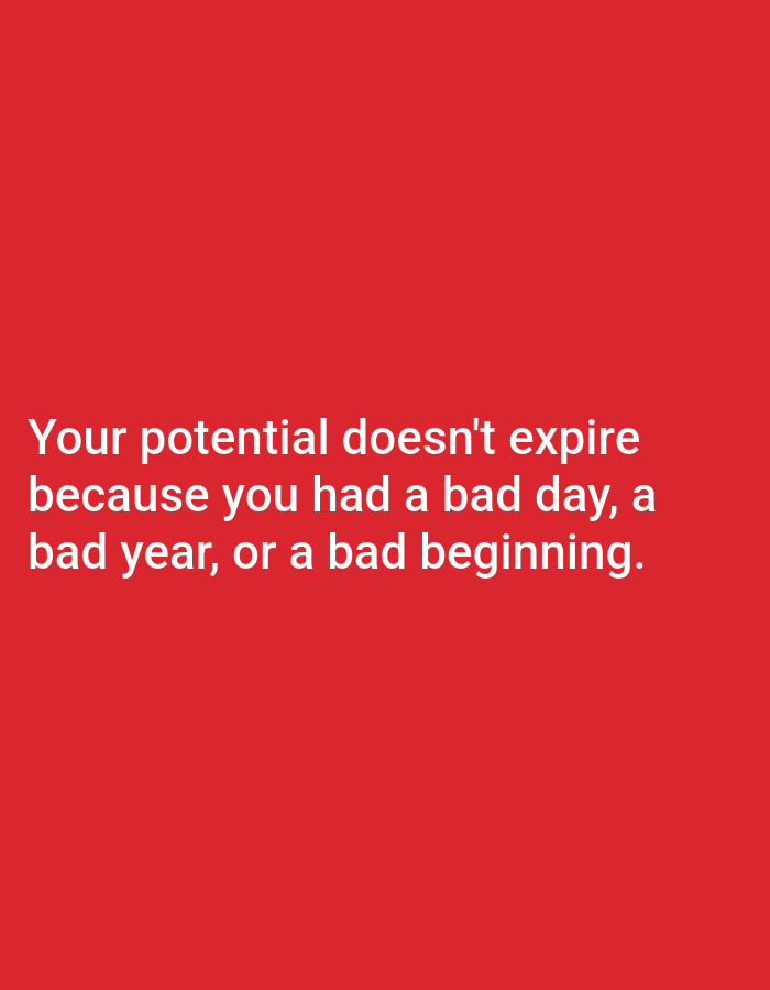 The image is a close-up of a bright red background. White text is centered on the background and reads: "Your potential doesn't expire because you had a bad day, a bad year, or a bad beginning."