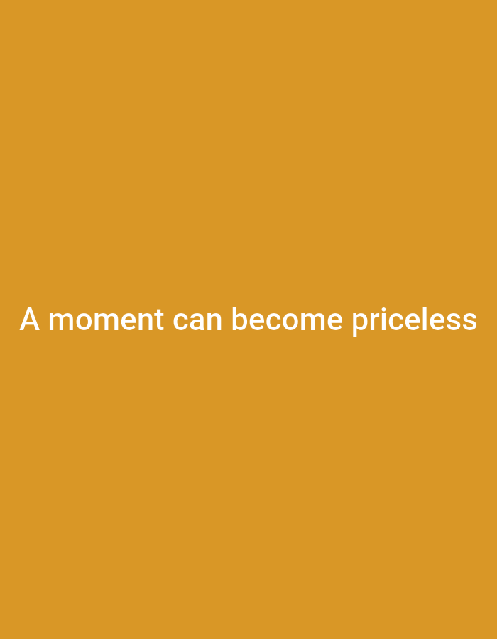 A digital image displays white text on a solid orange background. The text reads, "A moment can become priceless." The image does not depict any discernible location in South Jakarta, Indonesia, nor does it contain any people, subjects, objects, or actions.