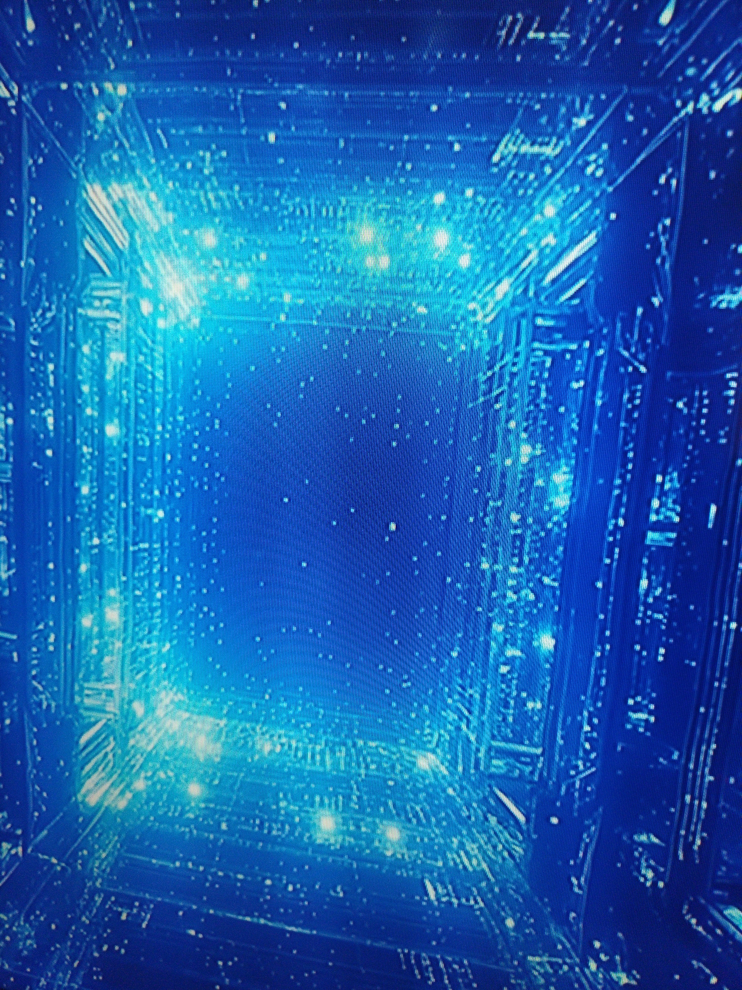 The image depicts a blue-toned, perspective view of an abstract, geometric structure reminiscent of a futuristic tunnel or corridor. The scene is characterized by intricate, grid-like patterns and numerous small, bright points that suggest light sources or digital artifacts. No people or identifiable objects are present, and the environment is devoid of natural elements. There is no indication of a specific location like Kramatorsk, Ukraine.
