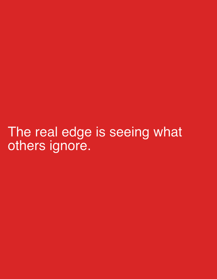 The image is a red background with the white text "The real edge is seeing what others ignore." The image does not contain any information to associate it with the city of Lokoja, Nigeria, or any other location. There are no people, subjects, objects, actions, or interactions visible in the image. The environment is a flat red background.