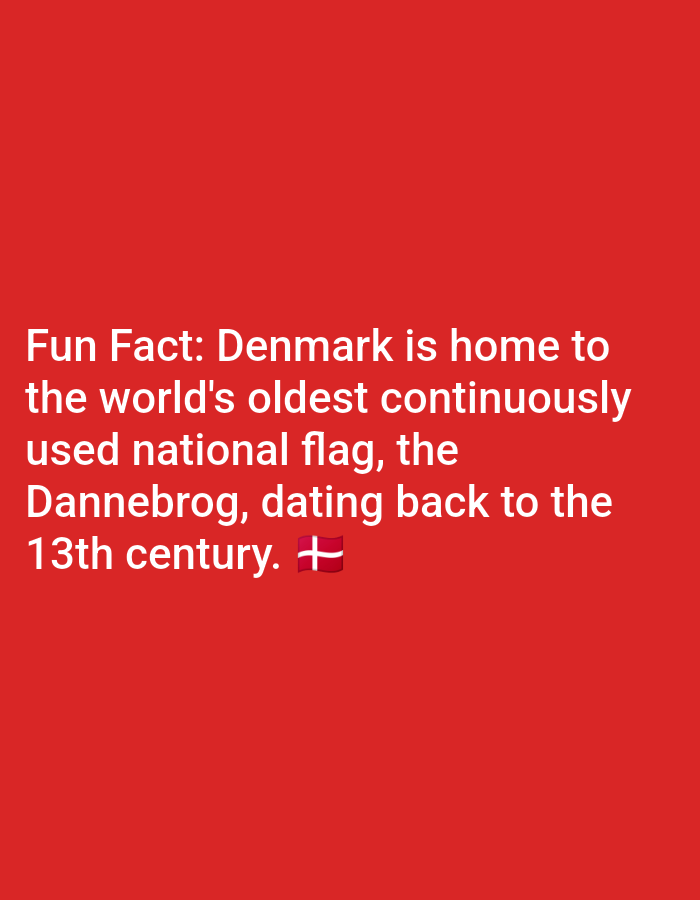 The image is a close-up, eye-level shot of a red background with white text. The text reads: "Fun Fact: Denmark is home to the world's oldest continuously used national flag, the Dannebrog, dating back to the 13th century." A Danish flag emoji is positioned to the right of the text. There is no discernible location in Lagos, Nigeria visible in this image, as it appears to be a digital graphic or poster.