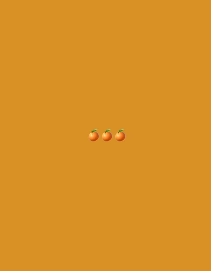 Three tangerines are arranged horizontally in the center of a plain, solid orange background.