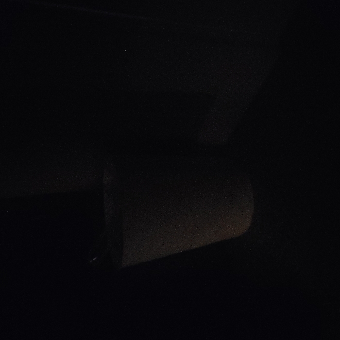 The image is too dark to discern any objects or details. The location is in Happy Valley, Oregon, USA, based on the coordinates provided.