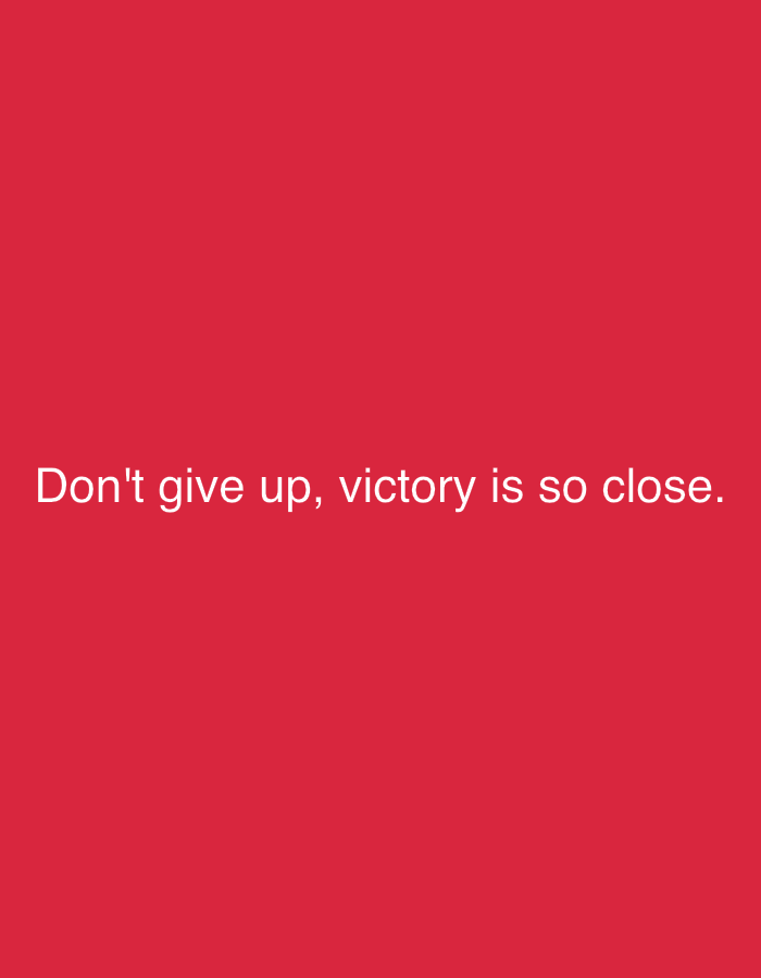 The image is a red rectangle with the text "Don't give up, victory is so close." in white. There is no indication of location or further information.