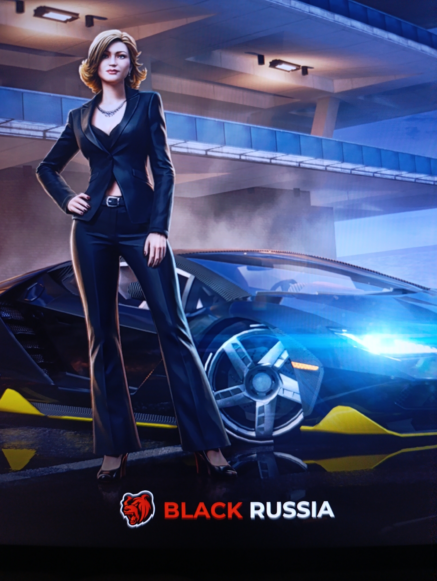 A color image shows a woman standing in front of a car with the words “BLACK RUSSIA” at the bottom. The woman has blonde hair and is wearing a black pantsuit and high heels. She is standing with her hand on her hip. The car is a sports car with a blue body and yellow accents. The background of the image is a highway overpass. The image appears to be from a video game. Зипуново, Russia, is not discernible from the image.