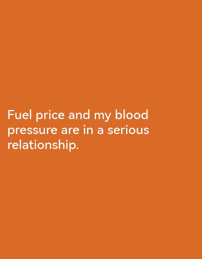 A photograph displays white text on an orange background. The text reads, "Fuel price and my blood pressure are in a serious relationship." There are no visible people, objects, or environmental details from Lagos, Nigeria, or any other location.