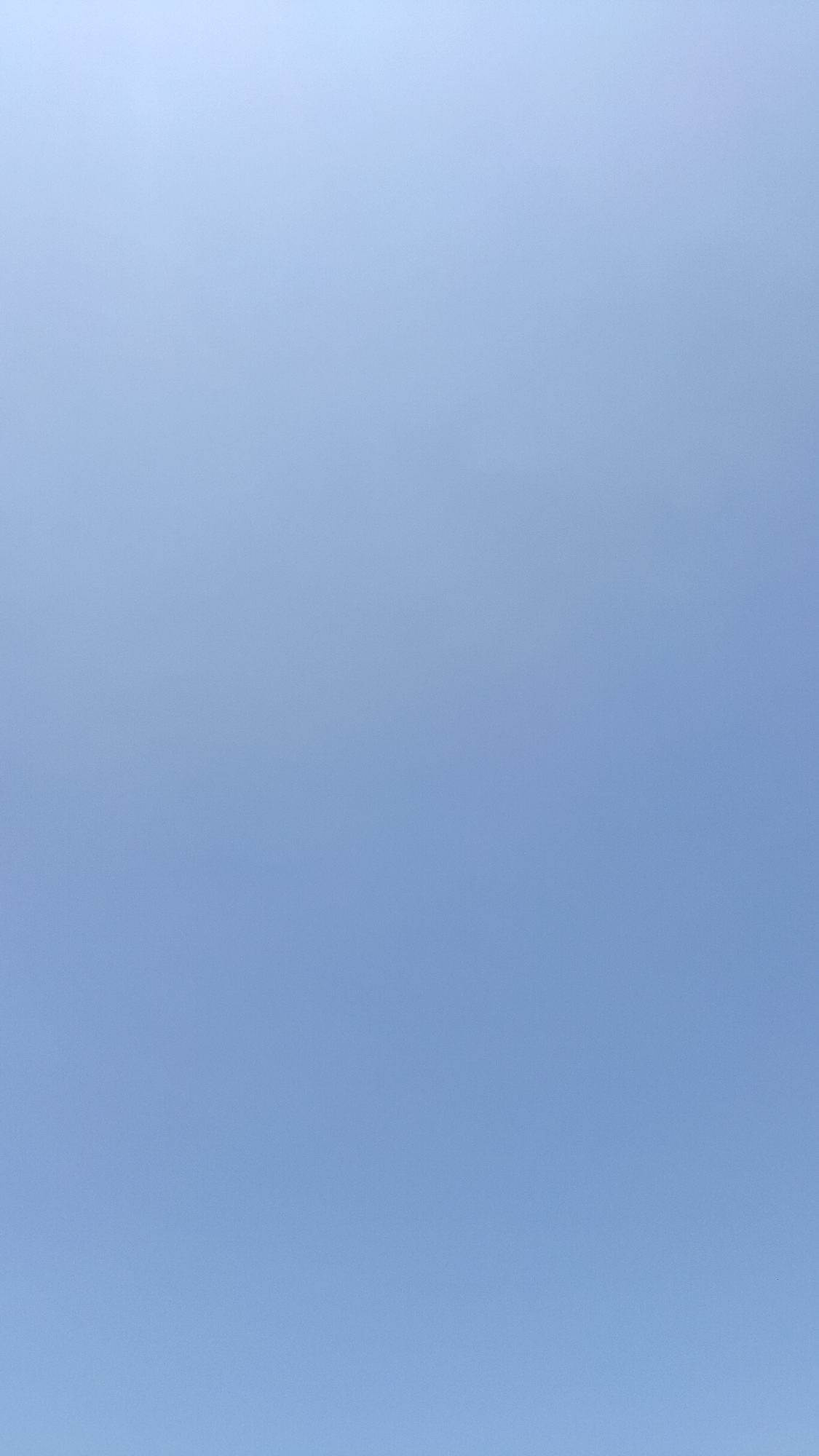 The image is a close-up of a clear blue sky, with no discernible objects, people, or features. The lighting suggests it is daytime. The location in Batarang, Indonesia, is not visually represented in the image itself.