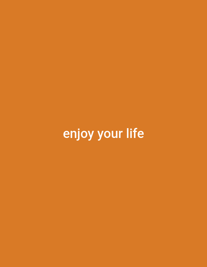 The image is a simple, minimalist graphic featuring white text on an orange background. The text reads "enjoy your life" in a sans-serif font, centered horizontally and vertically within the frame. There are no people, objects, actions, interactions, or environmental details present, as it is a purely typographic design. The location of Kepuh Kiriman, Indonesia, is not depicted or suggested in any way by the visual content of the image.