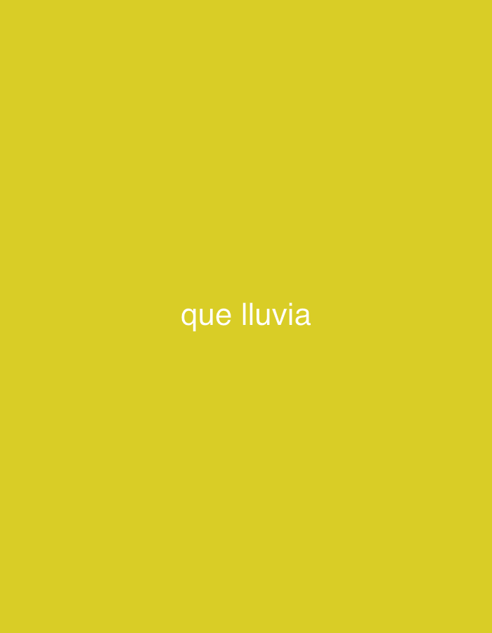 The image displays white sans-serif text, reading "que lluvia," positioned centrally on a solid, uniform yellow background. No people, objects, actions, interactions, or specific environmental details, including any location in the city of Altagracia, Venezuela, are discernible within the frame. The scene is purely graphic and text-based.