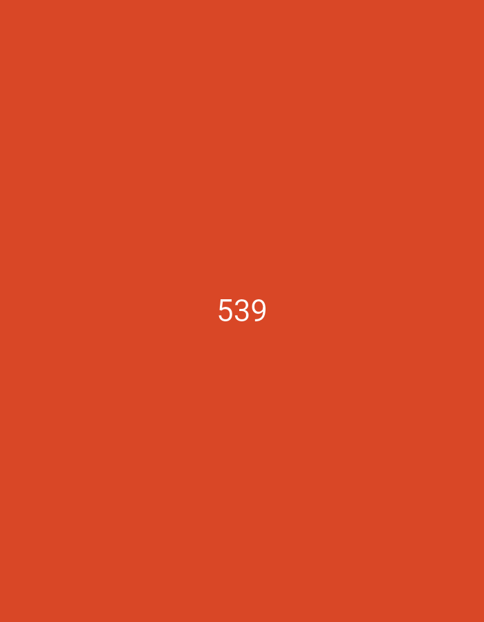 A photograph displays a solid orange background with the number "539" in white text centered on the image.