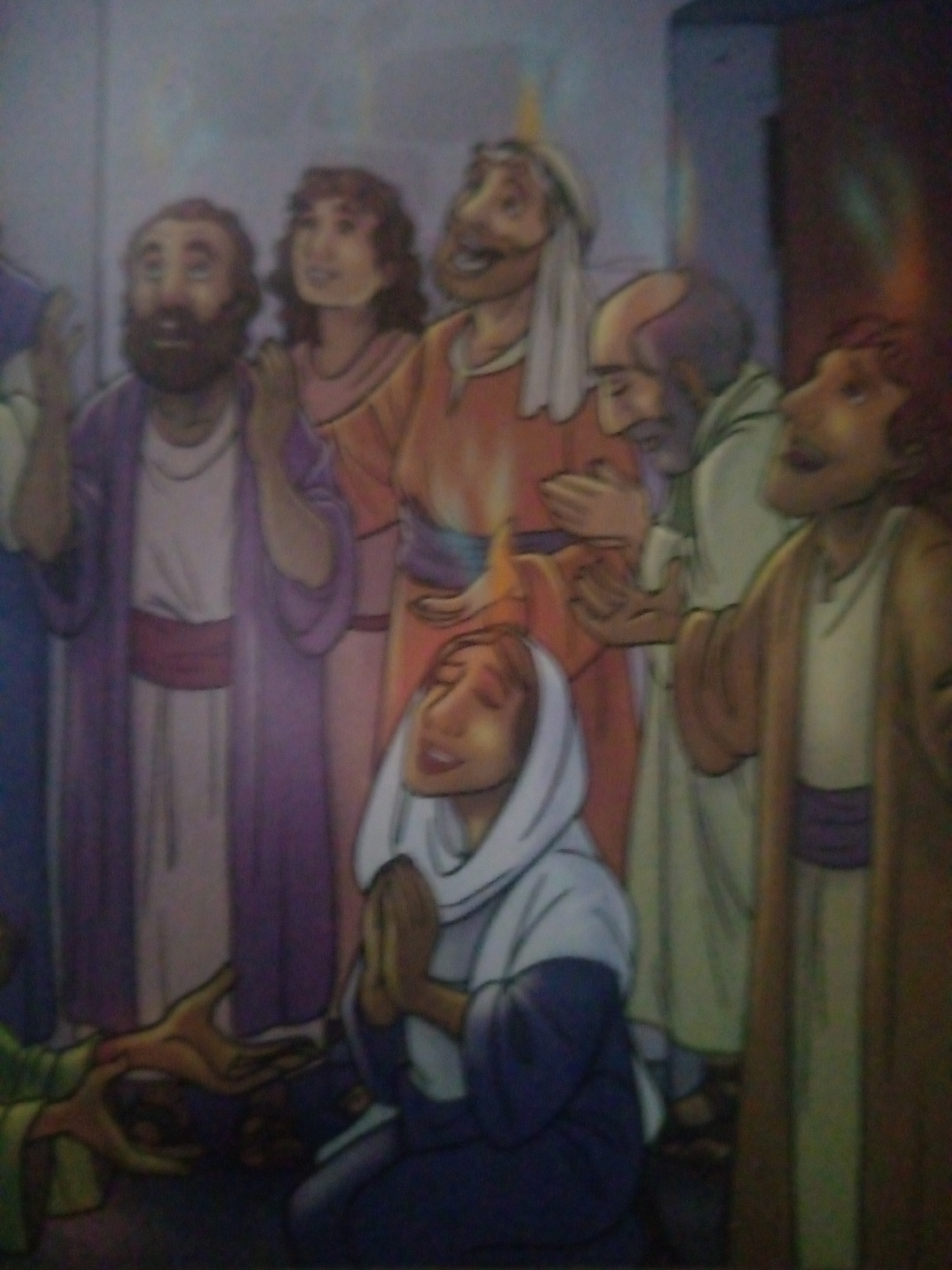The image depicts a religious or historical scene with multiple figures in flowing robes. The style is illustrative, possibly from a mural or a book illustration. The figures appear to be a mix of men and women, with varying facial features and expressions, suggesting a narrative or communal gathering. One individual in the foreground is kneeling or prostrating, with hands extended upwards, a posture often associated with prayer or supplication. Other figures stand behind and around, some looking upwards, others in discussion or observation. The color palette is muted with earthy tones and some richer purples and oranges. There is no discernible element in the image that would allow for the identification of a specific location in Jalingo, Nigeria. The background is a nondescript wash of color, offering no environmental context. The image does not contain any specific objects that would indicate a particular time period or cultural context beyond a general historical or religious setting.