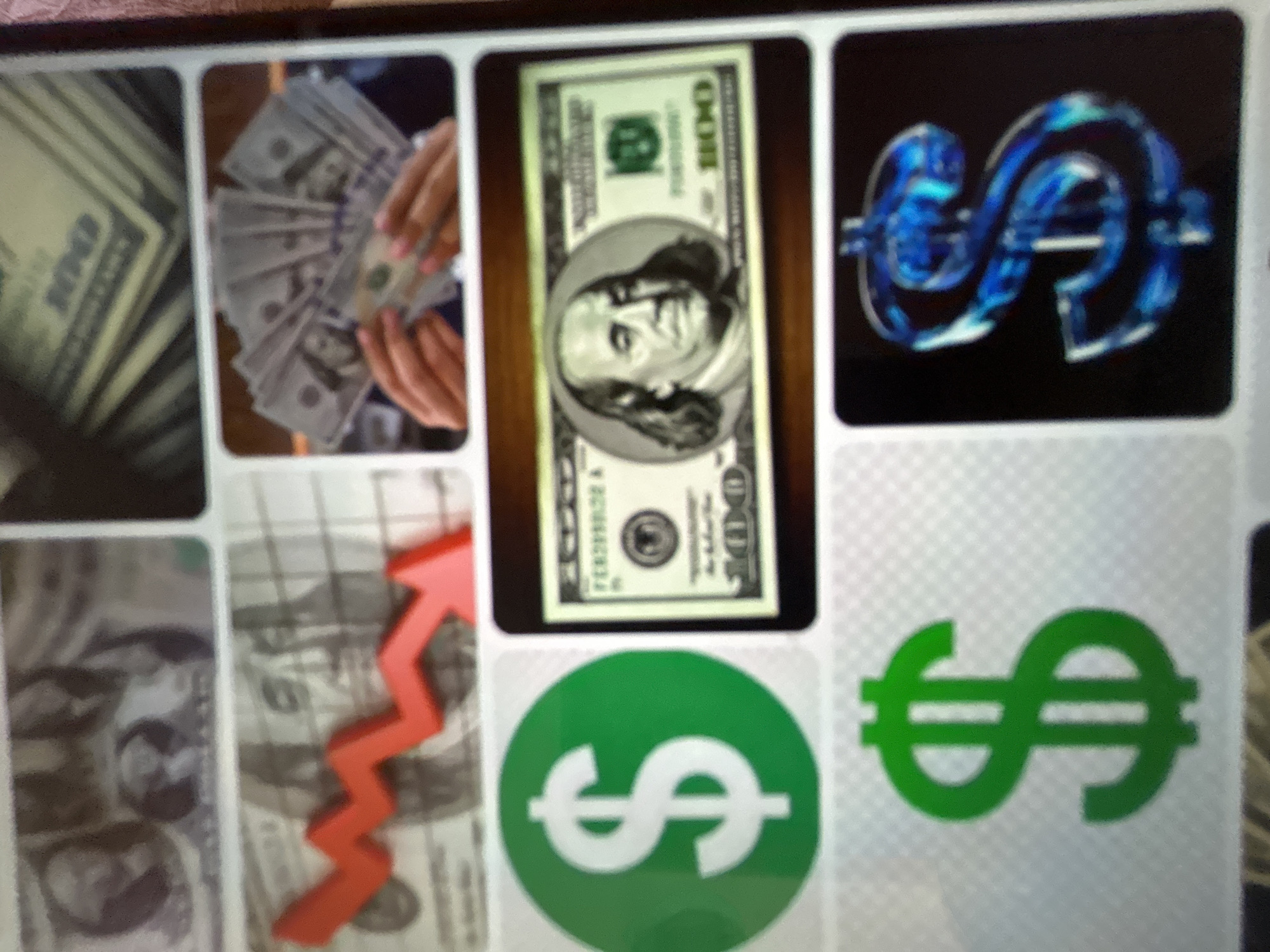 This media file is a collage of images related to money. The subjects include U.S. dollar bills, hands holding money, and dollar sign graphics. There are no discernible people besides hands, and no specific scene or setting is evident beyond the financial theme.
The activities or events depicted are implied financial transactions or the concept of wealth. One image shows hands fanning out a large sum of U.S. dollar bills, suggesting counting or displaying money. Another image features a single U.S. one hundred dollar bill prominently displayed. Several graphic elements include stylized dollar signs in blue and green, some within circles. One image shows a red upward-trending graph superimposed on dollar bills, symbolizing financial growth.
Notable details are limited due to the abstract nature of most of the images. The time of day, weather, and specific location cues are absent. The overall emotion conveyed is one of wealth, financial success, or money.
Visible text includes "100" on the U.S. dollar bills. There is also some unreadable text on the bills. The dollar sign graphics are not text in the conventional sense.
The requested location context of Gelendzhik, Russia, does not appear to be represented or relevant to the content of the images.