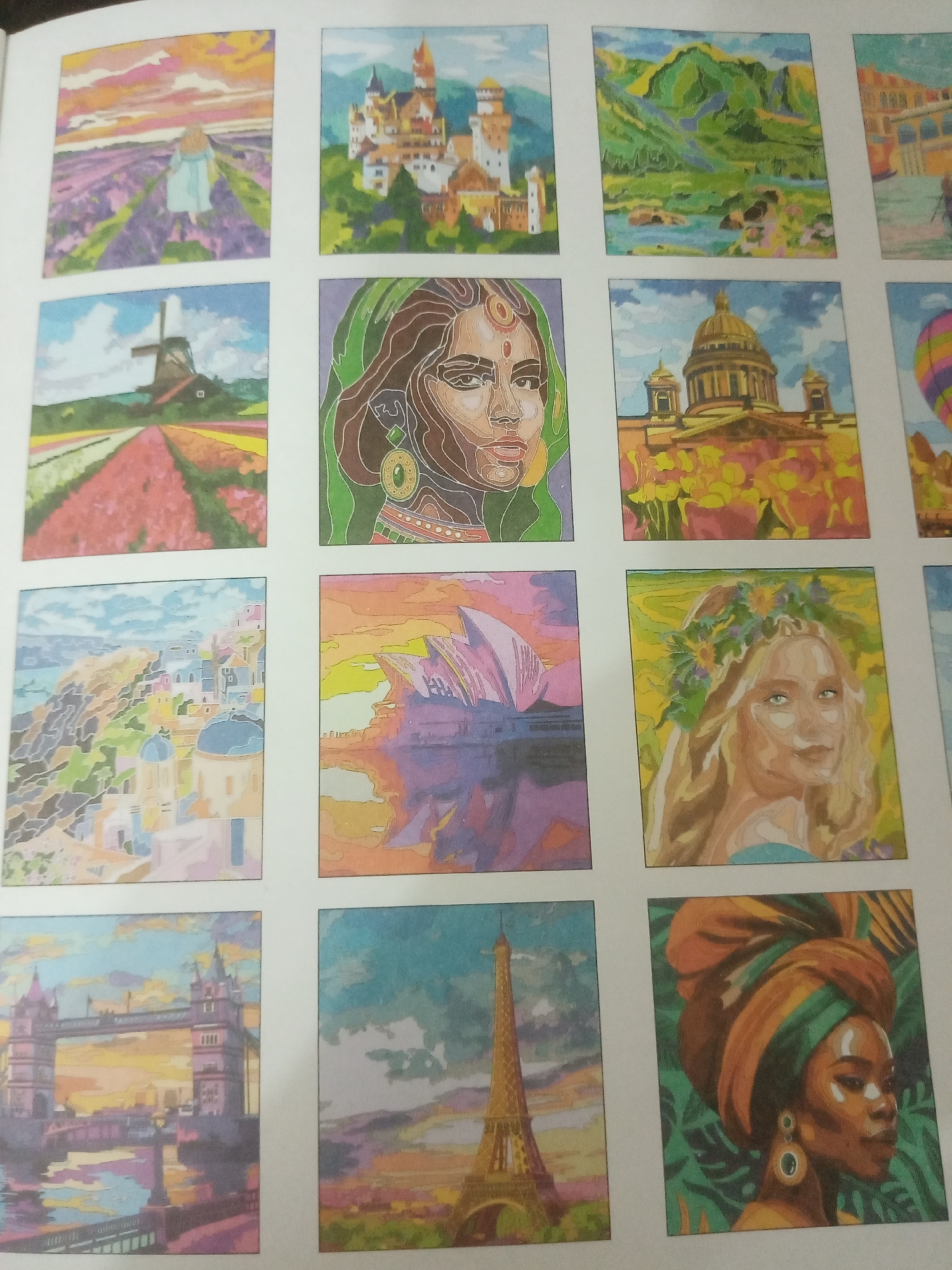 The image shows a collection of small, square, hand-painted images arranged in a grid on a white background. The subjects vary, including landscapes, buildings, and portraits. Some specific locations and subjects depicted are:
* A lavender field with a figure walking through it.
* A castle.
* A mountainous landscape with a river.
* A windmill in a tulip field.
* A portrait of an Indian woman with traditional jewelry.
* St. Isaac's Cathedral (likely St. Petersburg, Russia).
* A coastal town with whitewashed buildings and blue domes.
* The Sydney Opera House.
* A portrait of a blonde woman with a flower crown.
* The Tower Bridge in London.
* The Eiffel Tower in Paris.
* A portrait of a Black woman wearing a turban and earrings.
There is no information that directly references or takes place in Elektrostal, Russia.
