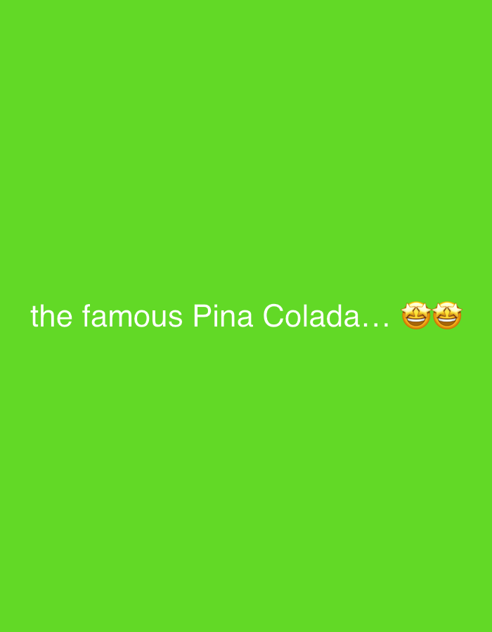 The image displays a bright, solid lime green background, reminiscent of a digital screen or graphic. Centered horizontally and positioned in the lower mid-section, white text reads: "the famous Pina Colada..." Following the ellipses are two yellow "star-struck" face emojis, conveying enthusiasm or admiration. There are no visible people, objects, or specific scenes depicted beyond the text and emojis on the plain background. No particular time of day or weather conditions are discernible. While the image itself lacks location cues, it is presented in the context of Milan, Italy. The overall impression is a simple, graphic post expressing anticipation or appreciation for a Pina Colada.