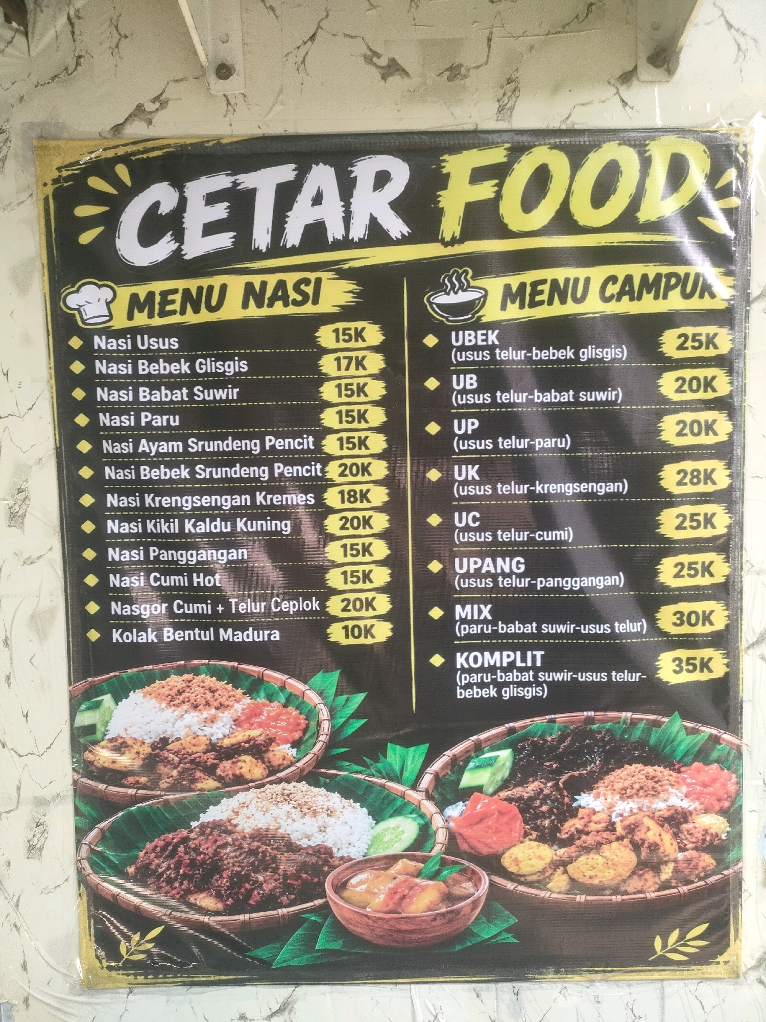 The image displays a menu board for "CETAR FOOD" in Surabaya, Indonesia. The menu is divided into two sections: "MENU NASI" and "MENU CAMPUR". Each item is listed with its name and price in Indonesian Rupiah, denoted by "K" for thousand.
The "MENU NASI" section features items such as:
- Nasi Usus (15K)
- Nasi Bebek Glisgis (17K)
- Nasi Babat Suwir (15K)
- Nasi Paru (15K)
- Nasi Ayam Srundeng Pencit (15K)
- Nasi Bebek Srundeng Pencit (20K)
- Nasi Krengsengan Kremes (18K)
- Nasi Kikil Kaldu Kuning (20K)
- Nasi Panggangan (15K)
- Nasi Cumi Hot (15K)
- Nasgor Cumi + Telur Ceplok (20K)
- Kolak Bentul Madura (10K)
The "MENU CAMPUR" section includes:
- UBEK (usus telur-bebek glisgis) (25K)
- UB (usus telur-babat suwir) (20K)
- UP (usus telur-paru) (20K)
- UK (usus telur-krengsengan) (28K)
- UC (usus telur-cumi) (25K)
- UPANG (usus telur-panggangan) (25K)
- MIX (paru-babat suwir-usus telur) (30K)
- KOMPLIT (paru-babat suwir-usus telur-bebek glisgis) (35K)
The board is presented in landscape orientation. The background of the menu board is black with yellow accents and graphics. Two images of Indonesian food are displayed at the bottom, one above the other, featuring rice, various meat and vegetable dishes, and side accompaniments. The overall setting appears to be an indoor food establishment.