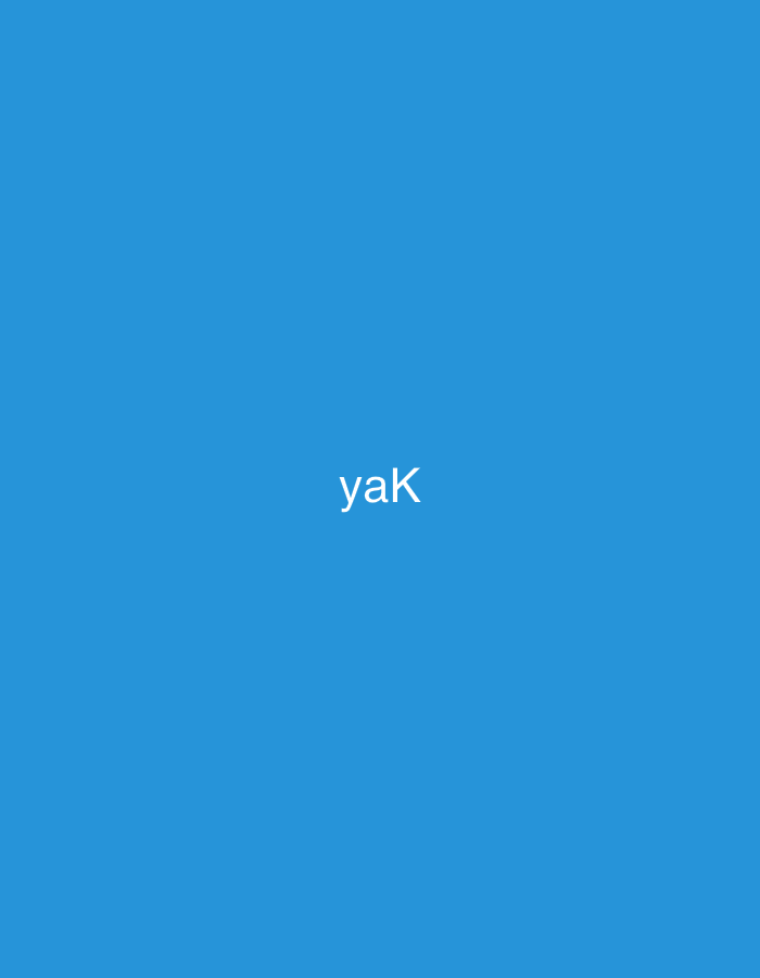 The image displays a solid, uniform blue background. Centered horizontally and slightly above the vertical midpoint, the text "yaK" is presented in white, sans-serif characters, with the first two letters in lowercase and the final letter capitalized. No other subjects, objects, people, actions, interactions, or environmental details are visible. The image provides no specific location information, including any indicators related to Casablanca, Morocco.