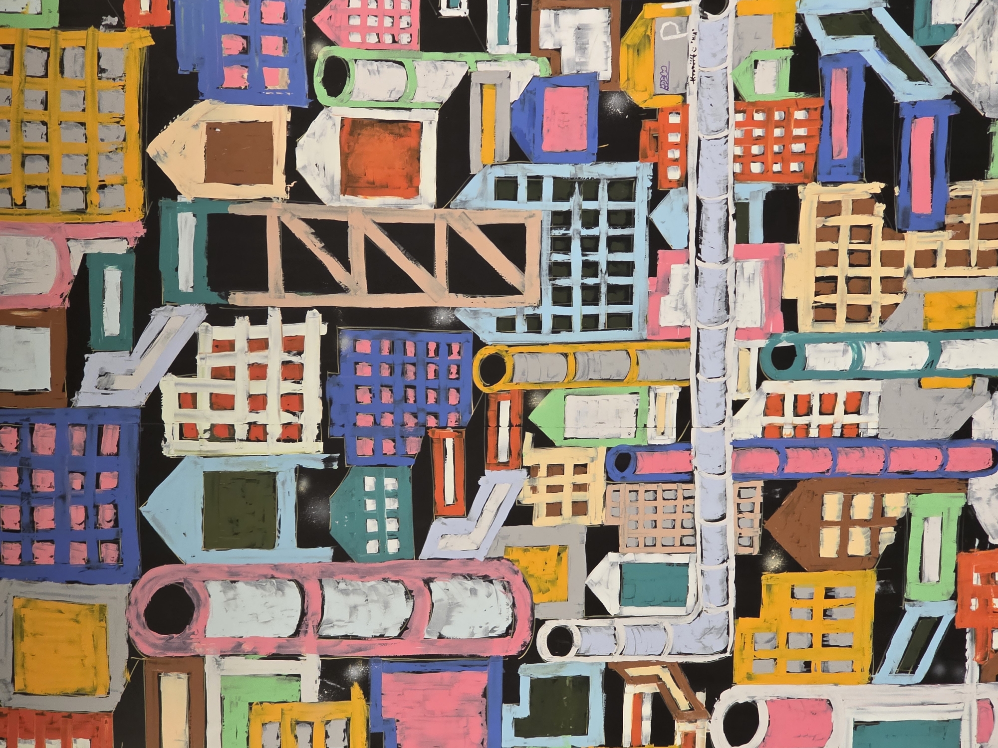 The image is an abstract, colorful painting depicting a cityscape. The background is black, and on top of it are various geometric shapes representing buildings, pipes, and possibly bridges. The buildings are represented by squares and rectangles, many with window grids in various colors like yellow, blue, pink, red, brown, and tan. Some shapes also have arrow-like extensions. Pipes are depicted as cylinders, some connected, running vertically through the image. The colors are flat and bold, and the shapes are outlined, creating a graphic, almost blueprint-like feel. The painting style is abstract expressionism or urban art. The location and time are not determinable given the painting's abstract nature. There are no people or actions depicted, as it is a representation of a built environment.
