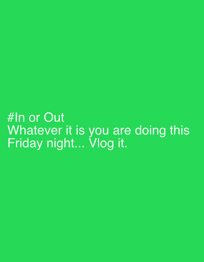 This is a photograph of a bright green background with white text overlaid. The text reads "#In or Out Whatever it is you are doing this Friday night... Vlog it." There is no discernible city, location in Chaikovsky, Russia, people, subjects, objects, actions, or interactions depicted. The image is a simple graphic with text.