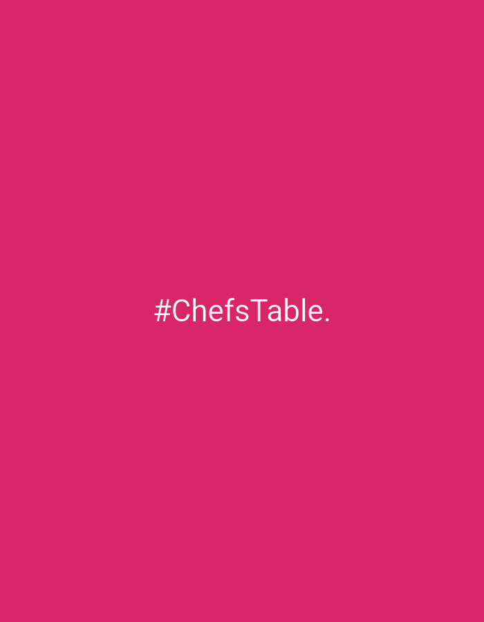 The image shows the text "#ChefsTable." centered on a solid magenta background. The location is not depicted in the image, so the request to include Riga, Latvia cannot be fulfilled.