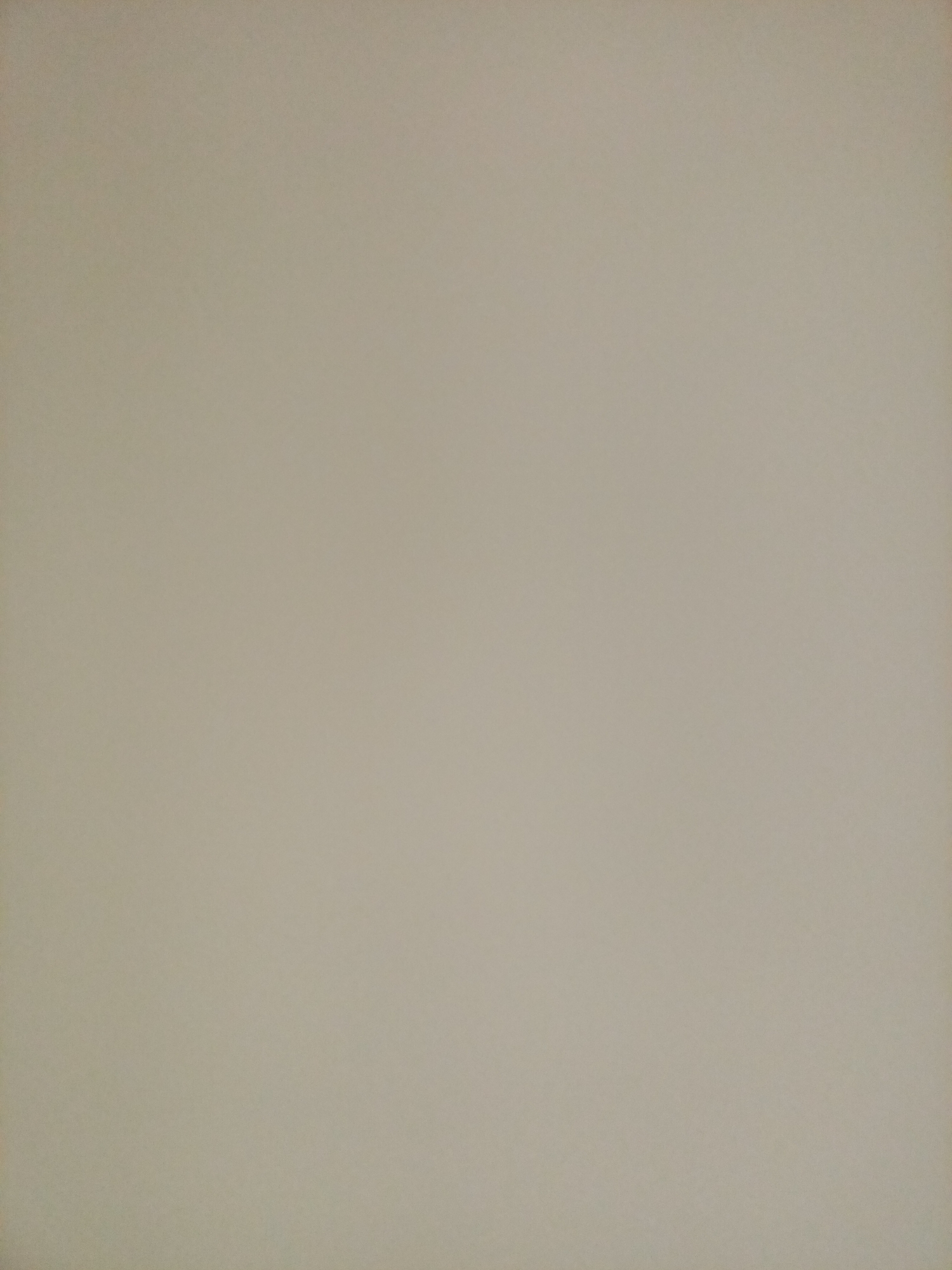 The image is a plain, light beige background, likely a wall or a flat surface. There are no discernible objects, people, or environmental features present in the image. The lighting appears uniform, with no shadows or highlights to suggest a specific location or time. The image is entirely devoid of any detail that would allow for identification of a specific city or location, including Rostov-on-Don, Russia.