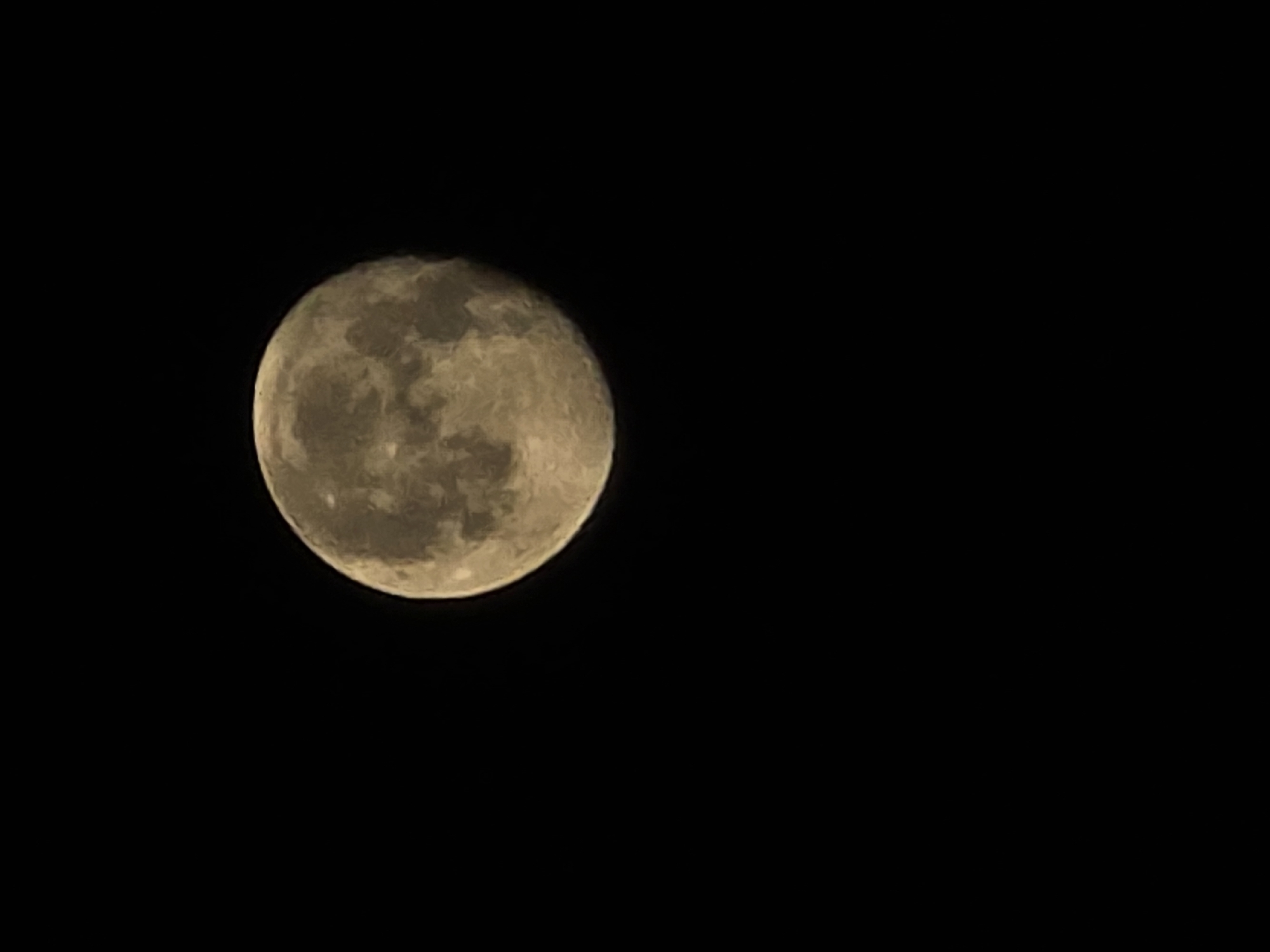 The image shows a full moon against a black sky. The moon is illuminated and its surface features, such as craters, are visible. The moon is positioned in the upper half of the frame. There are no other objects or elements present in the image. The dark sky suggests it is nighttime. The image does not contain any information that would indicate its location in Palma de Mallorca, Spain.