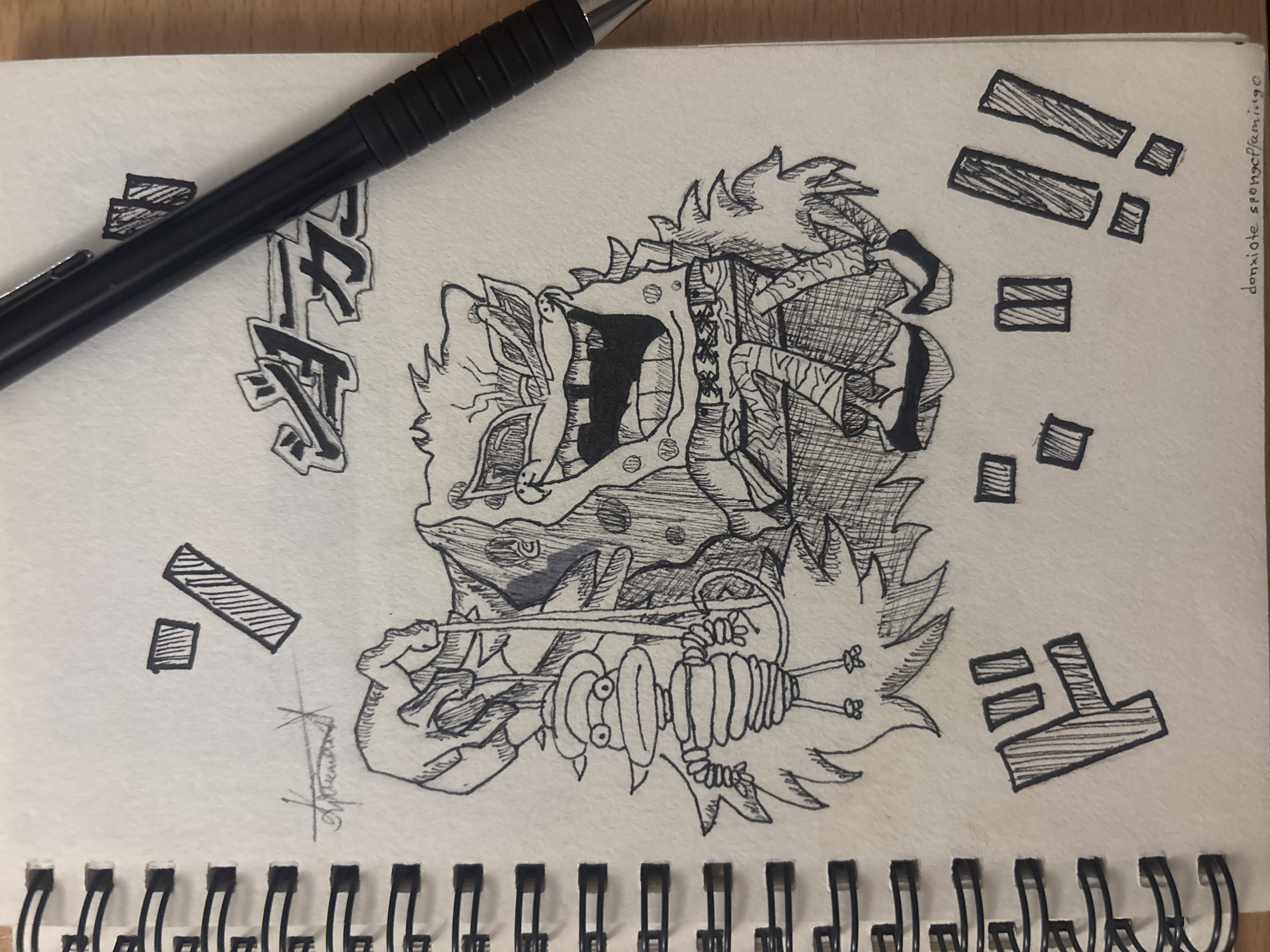 A sketch of an anime character on a spiral-bound notebook lies on a wooden surface. A black mechanical pencil rests diagonally across the top left of the notebook, partially covering stylized Japanese text. The character is rendered in black ink with a high level of detail, depicted mid-action with an open mouth and exaggerated expression. Surrounding the figure are various graphic elements, including exclamation marks and additional stylized Japanese text. A signature is visible at the bottom left. The notebook is positioned on a plain, light-colored wooden surface. There is no indication in the image as to its location being in Sofia, Bulgaria.