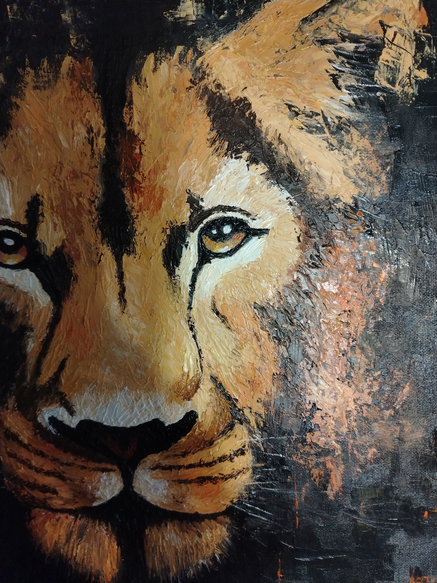 A close-up painting depicts the face of a lion, cropped on the right side. The lion's face is composed of various shades of brown, black, and white, with thick brushstrokes creating a textured effect. The lion's eyes are visible, with yellow irises and black pupils. The nose is black with white highlights, and there are black stripes across the lion's face. The background is dark, almost entirely black, providing a stark contrast to the lion's face. There is no information to suggest that the painting is physically located in Izhevsk, Russia.