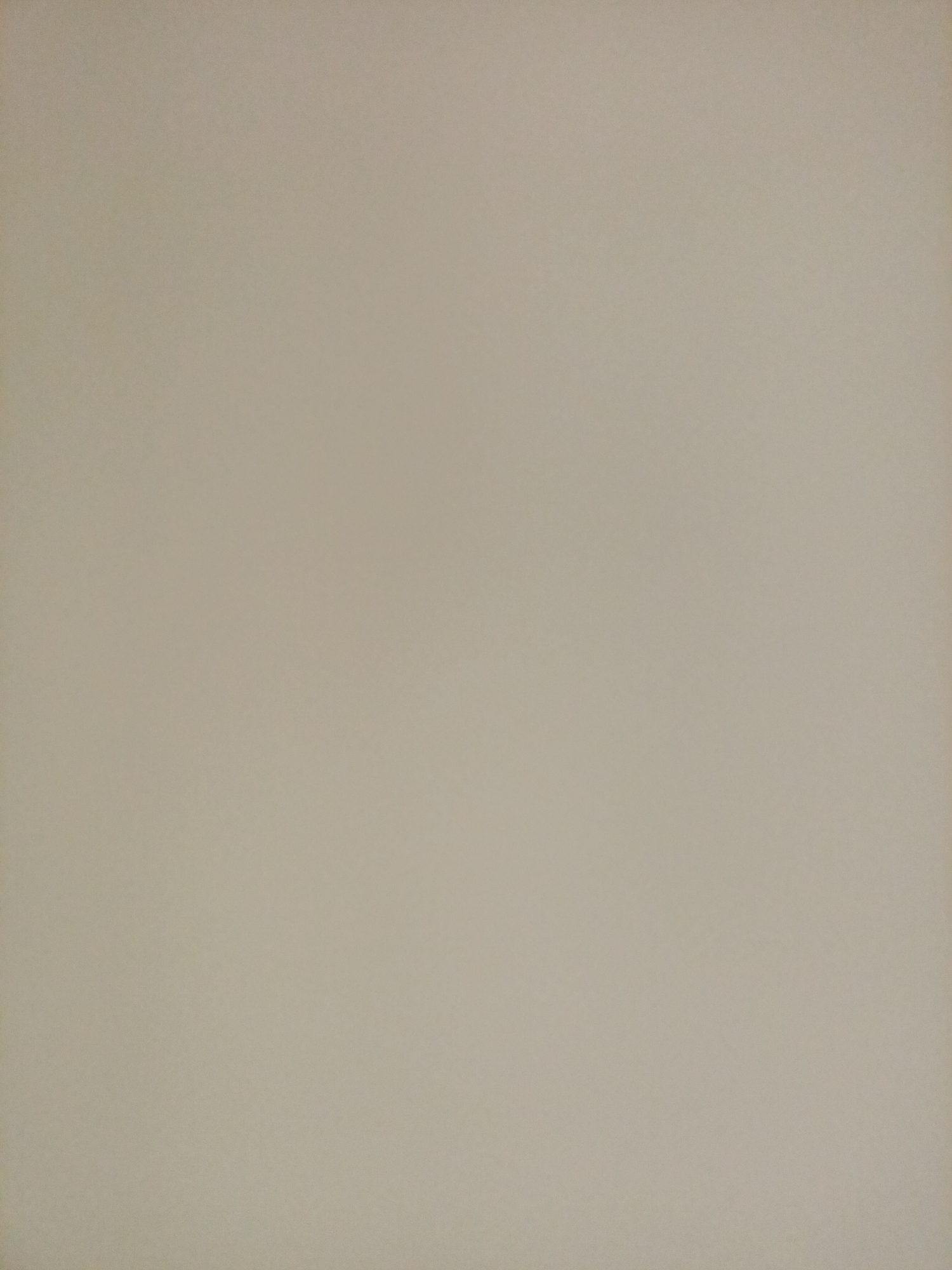 The image is a plain, neutral-toned background, likely a wall or a piece of fabric, with no discernible objects, people, or actions depicted. It is not possible to determine a location within Rostov-on-Don, Russia, or any specific environmental details from this image.