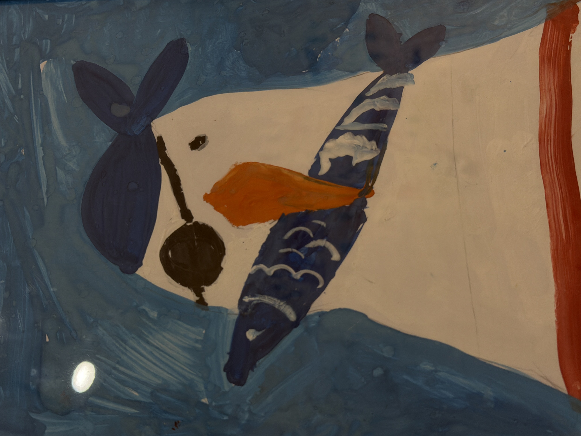 This media file is a vibrant, stylized painting, likely created by a child, featuring a central animal figure against a blue background with a prominent red vertical stripe on the right side.
The main subject is a white animal, possibly a bird or a fish, depicted with simplified forms and bold colors. It has a distinct orange beak or mouth. On its left side (viewer's top left), two large, dark blue, elongated shapes resemble ears or a decorative bow. On its right side, similar dark blue shapes with wavy white patterns extend, suggesting fins or a tail, further reinforced by the blue shapes below it which also feature wavy white lines. A dark circular shape is positioned below the orange beak, possibly representing an eye.
The background consists of various shades of blue, from deep navy to lighter, swirly sky blue, giving the impression of water or a cloudy sky. A bright white oval shape is visible in the bottom-left blue area, which could be a reflection or a light source. The bold red stripe on the far right provides a strong vertical contrast to the blues and white.
The painting style is characterized by thick, visible brushstrokes and a somewhat abstract or highly simplified approach, typical of children's art. No specific activity or event is taking place; it is a static artistic representation. There are no time-of-day, weather, or specific geographical location cues within the image itself, other than the general impression of an aquatic or aerial environment. No text is visible. The artwork originates from Sofiivska Borshchahivka, Ukraine.