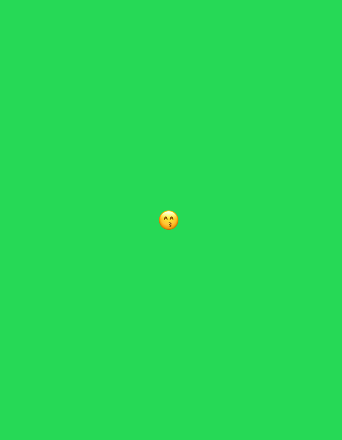 The image shows a green background with a yellow emoji of a face making a kissing gesture in the center. There is no discernible location in Moscow, Russia, or any other discernible environmental or contextual details.