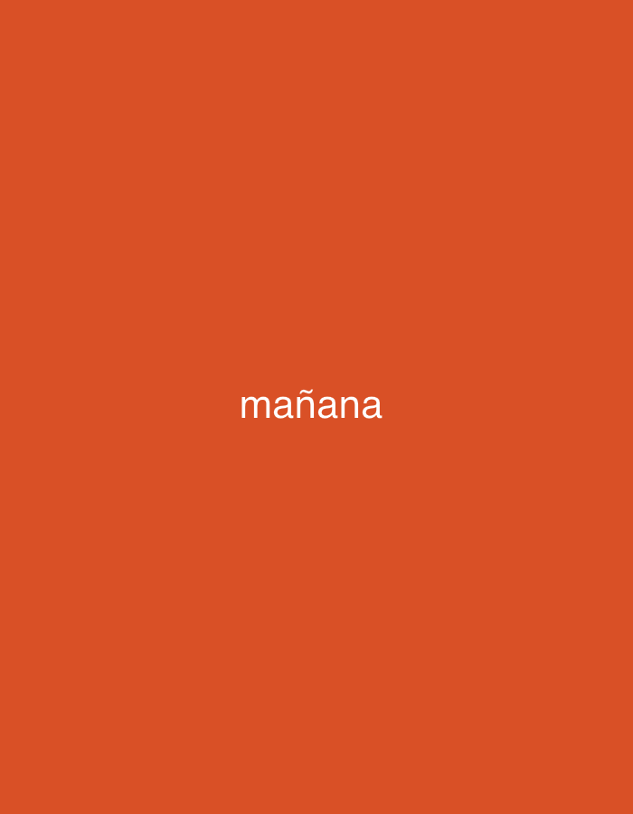 The image displays a solid, vibrant orange-red background with no visible people, objects, or discernible scene beyond the color field. Centered on this monochromatic background is the Spanish word "mañana" rendered in a simple, white, lowercase sans-serif typeface. There is no activity taking place, nor are there any specific location cues, weather indicators, or emotional expressions. The only notable detail is the clear, white text against the bold, warm-toned backdrop.