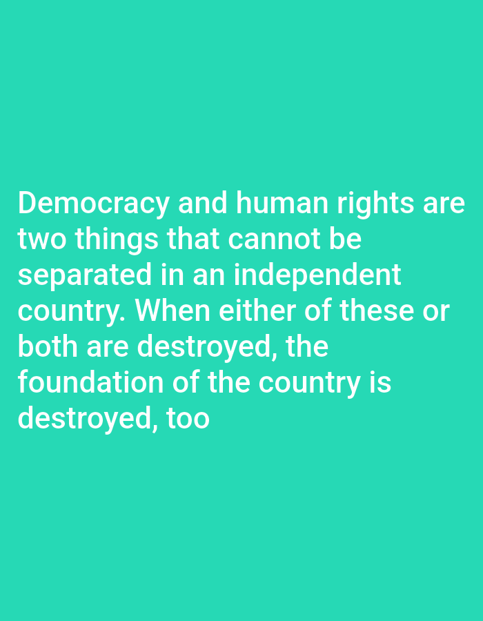 The image contains text on a teal background. The text reads: "Democracy and human rights are two things that cannot be separated in an independent country. When either of these or both are destroyed, the foundation of the country is destroyed, too". There are no people, objects, actions, or interactions visible in the image. The background is a solid, uniform teal color. There is no information about the location in Payagaboh, Indonesia, as this is a text-based image.