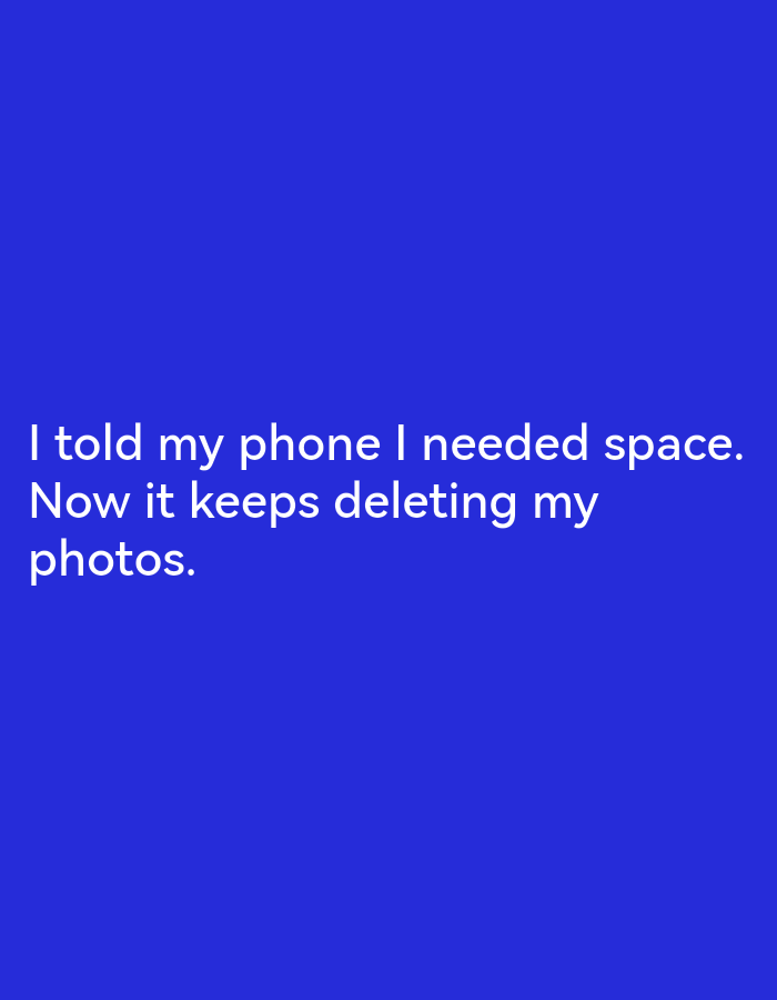 A short, humorous text is displayed in white font against a solid royal blue background. The text reads: "I told my phone I needed space. Now it keeps deleting my photos." There are no discernible people, objects, actions, interactions, or environmental features present in the image, and it cannot be geolocated to Lagos, Nigeria or any other specific location.
