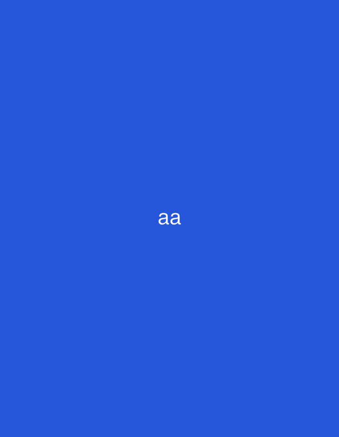 The image displays a solid blue background with two lowercase 'a' characters rendered in white text, centrally positioned on the frame. There are no other discernible subjects, objects, figures, actions, or environmental details within the visual scope. The scene is situated within the city of Casablanca, Morocco.