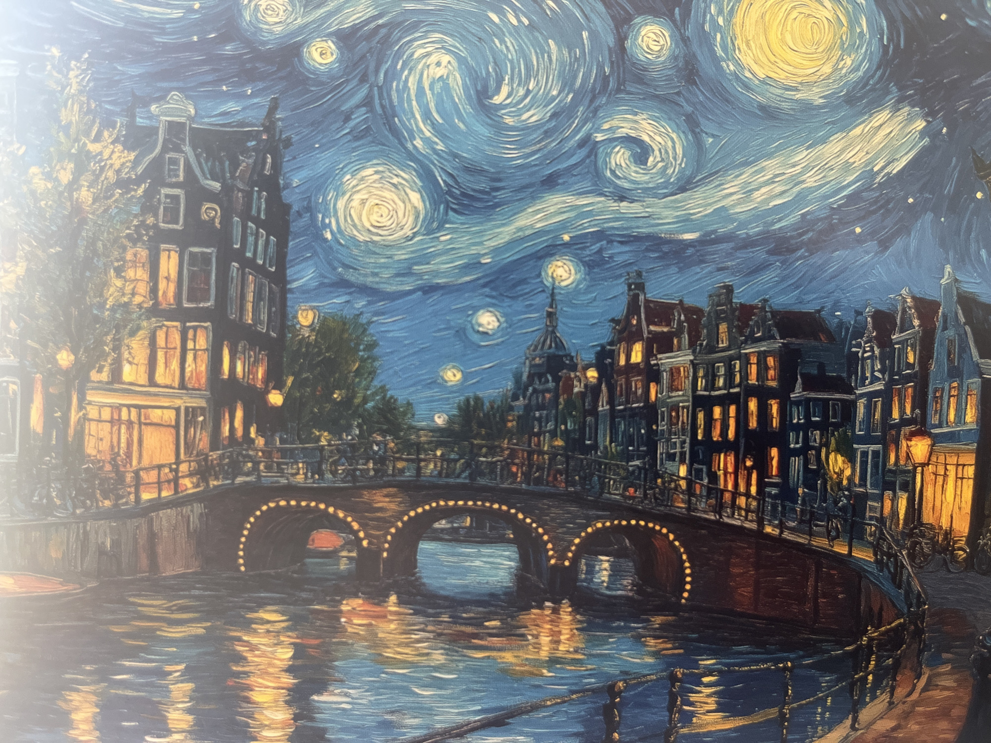 The image is a painting of a city canal at night, in the style of Vincent van Gogh's "The Starry Night." The sky is filled with swirling blue and yellow brushstrokes, representing stars and a large moon. Buildings line the canal, with lights glowing from the windows. A bridge arches over the water, illuminated by a string of lights. The water reflects the lights from the buildings and the bridge, creating a shimmering effect. There are no people or specific activities depicted in the painting, other than the general ambiance of a lively, lit-up city at night.
The question asks to include the location in the city of Limassol, Cyprus. However, the image itself does not contain any information or visual cues that would place it in Limassol, Cyprus. The style of architecture and the canal setting are more reminiscent of cities like Amsterdam. Therefore, it is not possible to identify this scene as being in Limassol, Cyprus based on the provided image.