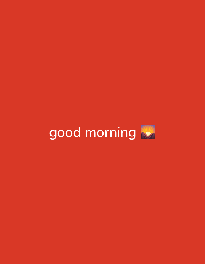 The image is a close-up shot of a bright red background. In the center of the image, white text reads "good morning" followed by a sunset emoji. The text is positioned horizontally and is the only element present besides the red background. There are no people, objects, or environmental details visible in the image, and it does not depict any location in a city.