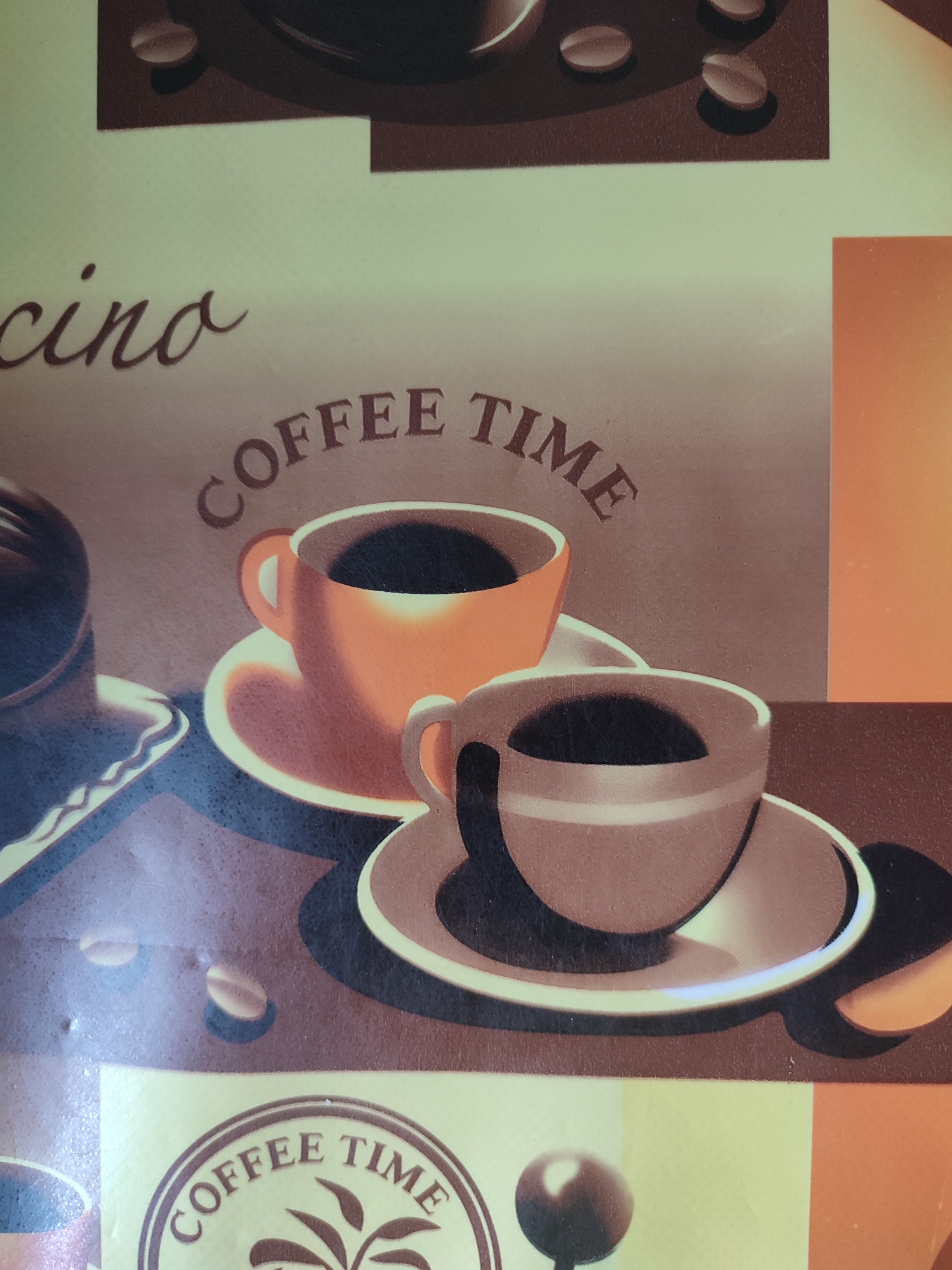 The media file displays a close-up, top-down view of a decorative surface featuring coffee-themed imagery. The design includes several stylized coffee cups, some filled with dark liquid, placed on saucers. Coffee beans are also depicted. The overall aesthetic is warm and inviting, with earthy tones of brown, orange, and cream.
The visible text includes "cino" in a script font on the upper left, and the words "COFFEE TIME" are prominently displayed in a decorative font on two separate occasions. One instance of "COFFEE TIME" is arched above two coffee cups, while another appears within a circular emblem at the bottom center of the image.
The lighting suggests an indoor setting, possibly a table or wall decoration. There are no people or animals present. The image's composition and design evoke a sense of relaxation and enjoyment associated with drinking coffee. The detail of coffee beans and cups suggests a focus on the beverage itself and the experience of consuming it. The decorative nature of the image, with its stylized graphics and repeating motifs, indicates it is likely part of a product or interior design element. No specific time of day, weather, or location cues are evident beyond the general coffee shop or home kitchen theme. There are no apparent emotions conveyed, as the media file focuses solely on the objects and text.