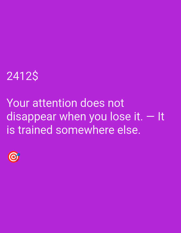 This is a photograph of a motivational quote overlaid on a solid purple background. The text, in white, reads: "2412$ Your attention does not disappear when you lose it. — It is trained somewhere else." Below the text, in the bottom left corner, there is a small circular graphic of a target with an arrow in the bullseye. The background is evenly lit, suggesting it was taken indoors or under controlled lighting conditions. There are no people or other objects visible in the image besides the text and the target graphic. The overall impression is that of a digital graphic designed for social media or as a motivational poster.