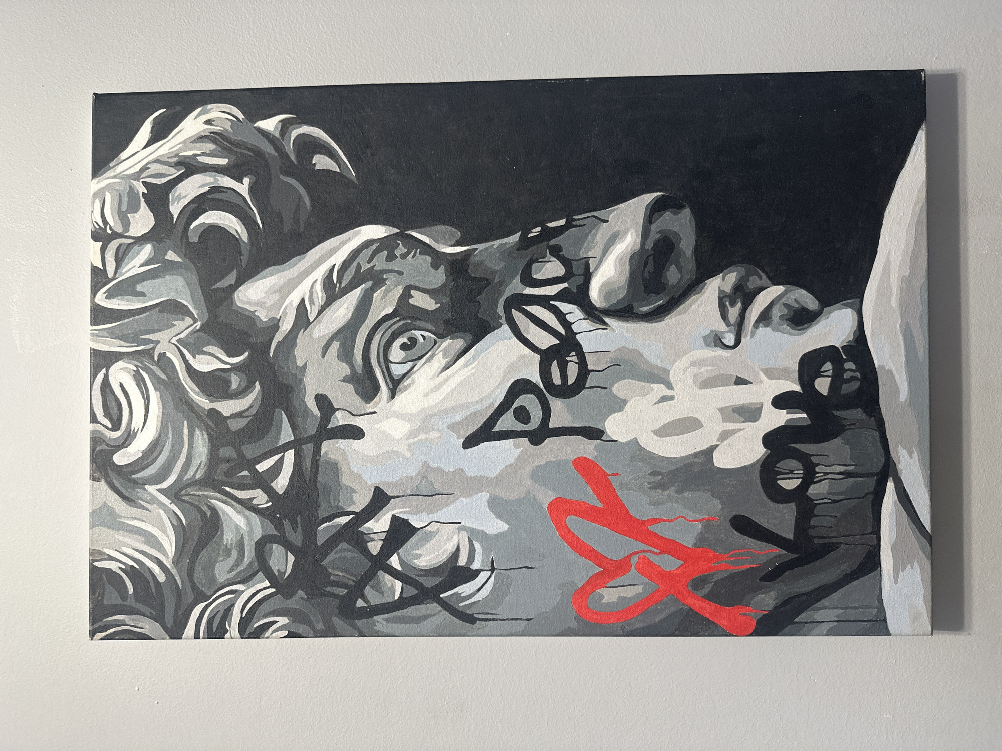 A painting depicting the head of a statue, possibly Michelangelo's David, is mounted on a light grey wall. The artwork is primarily rendered in shades of grey and black, with splashes of white and a vibrant red graffiti-style element. The statue head is shown in profile, with the face angled upward. Graffiti-like strokes and shapes are overlaid on the image, concentrated around the face. The environment is a plain, undecorated wall. This image gives no information about the city of Yakutsk, Russia.