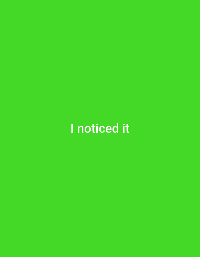A white text overlay reads "I noticed it" centered on a bright green background. The image is a solid color with no discernable setting or location.
