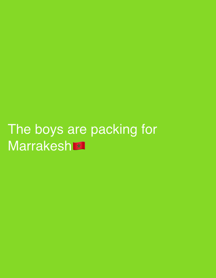 A green background features white text that reads "The boys are packing for Marrakesh" with a Moroccan flag emoji next to it.